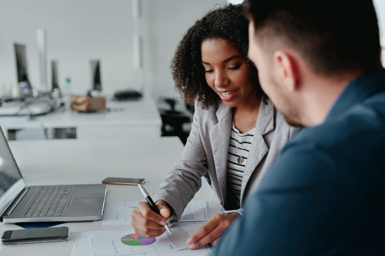 A direct outreach marketer explaining their product to a client