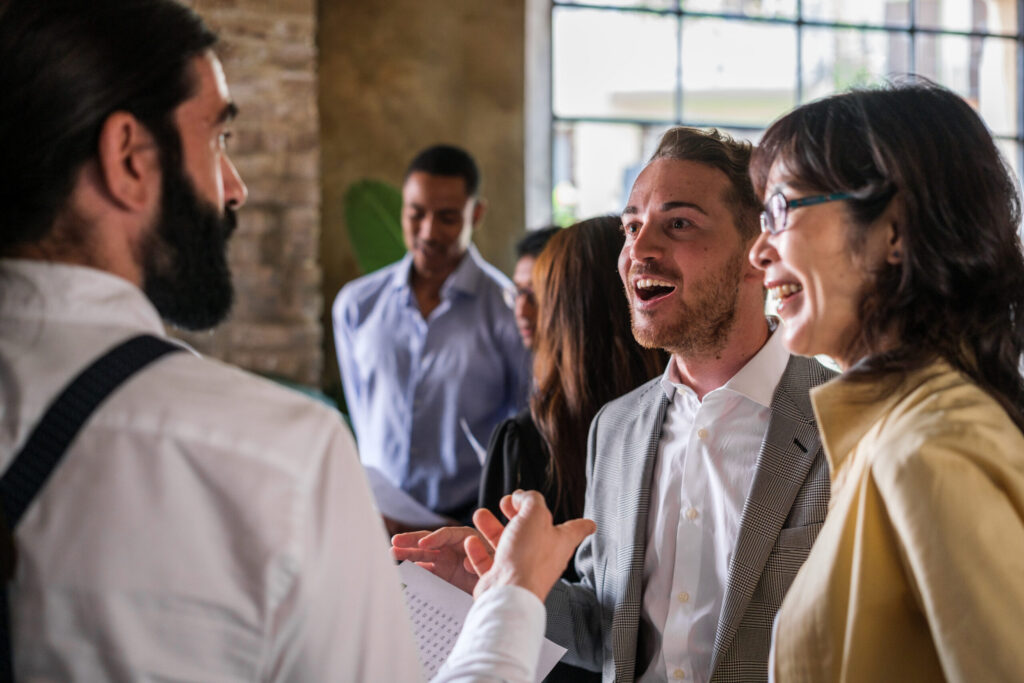 A group of people networking with each other