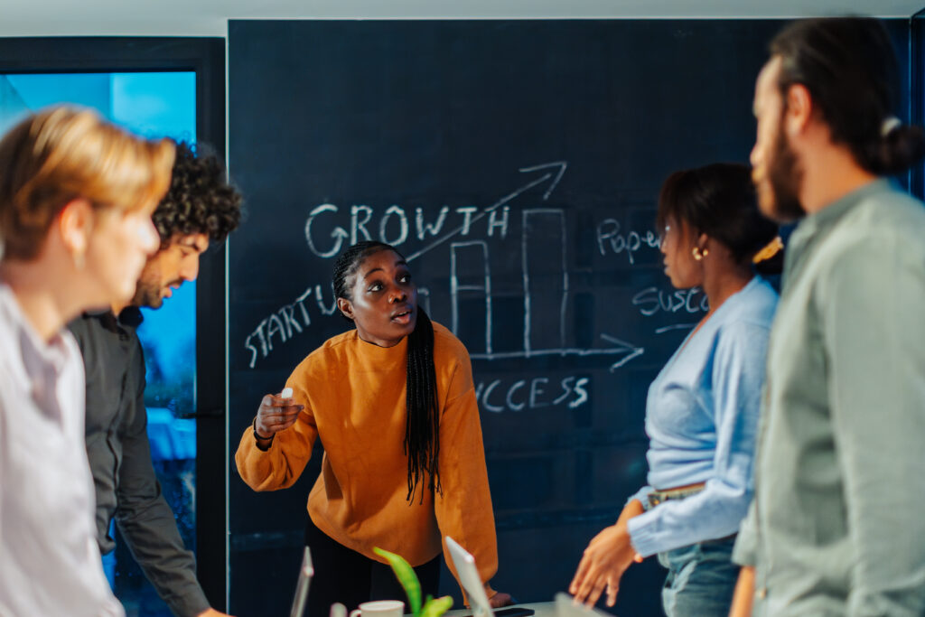 An on-the-ground sales team discussing growth opportunities