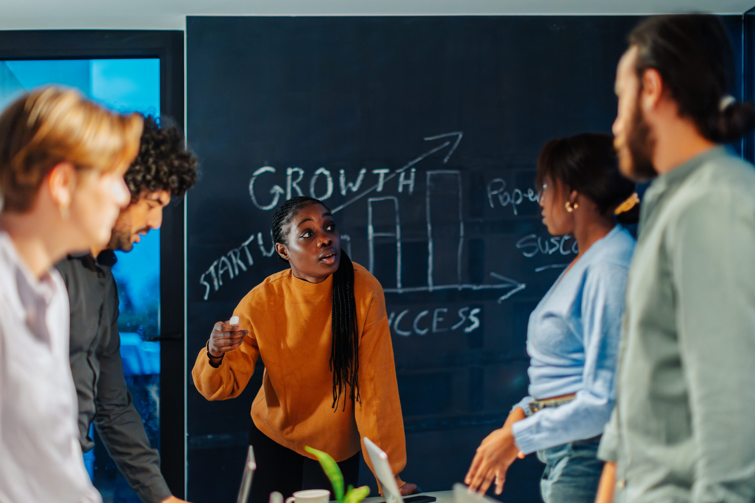An on-the-ground sales team discussing growth opportunities